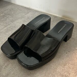 Black rubber like platform shoes
